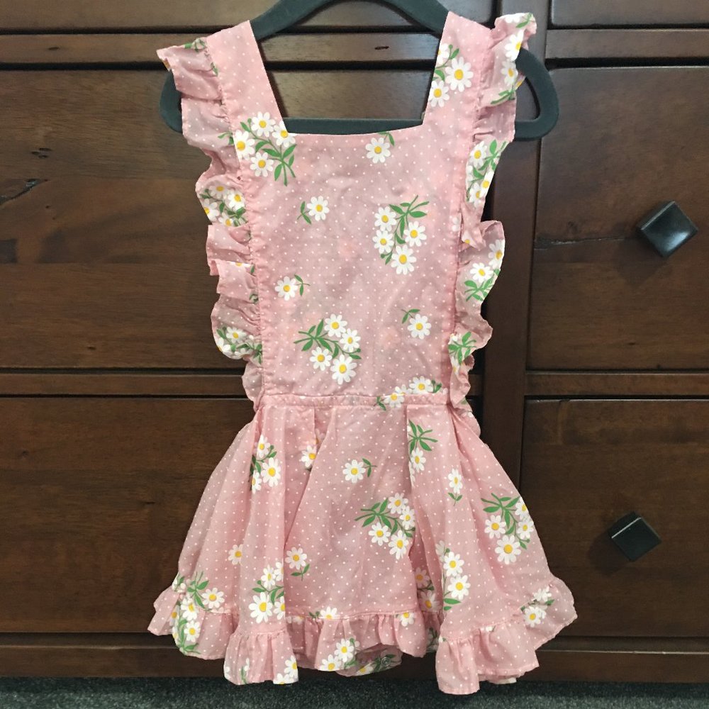 Numi pink with white dotted swiss and white daisies pinafore, attached bloomers